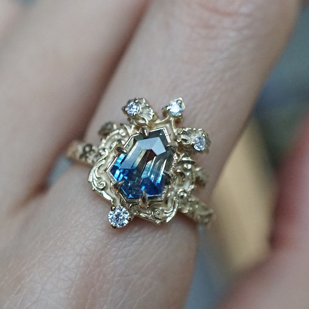 One Of A Kind: Bi Color Sapphire Shield Paradise Ring in 14K and 18K Gold