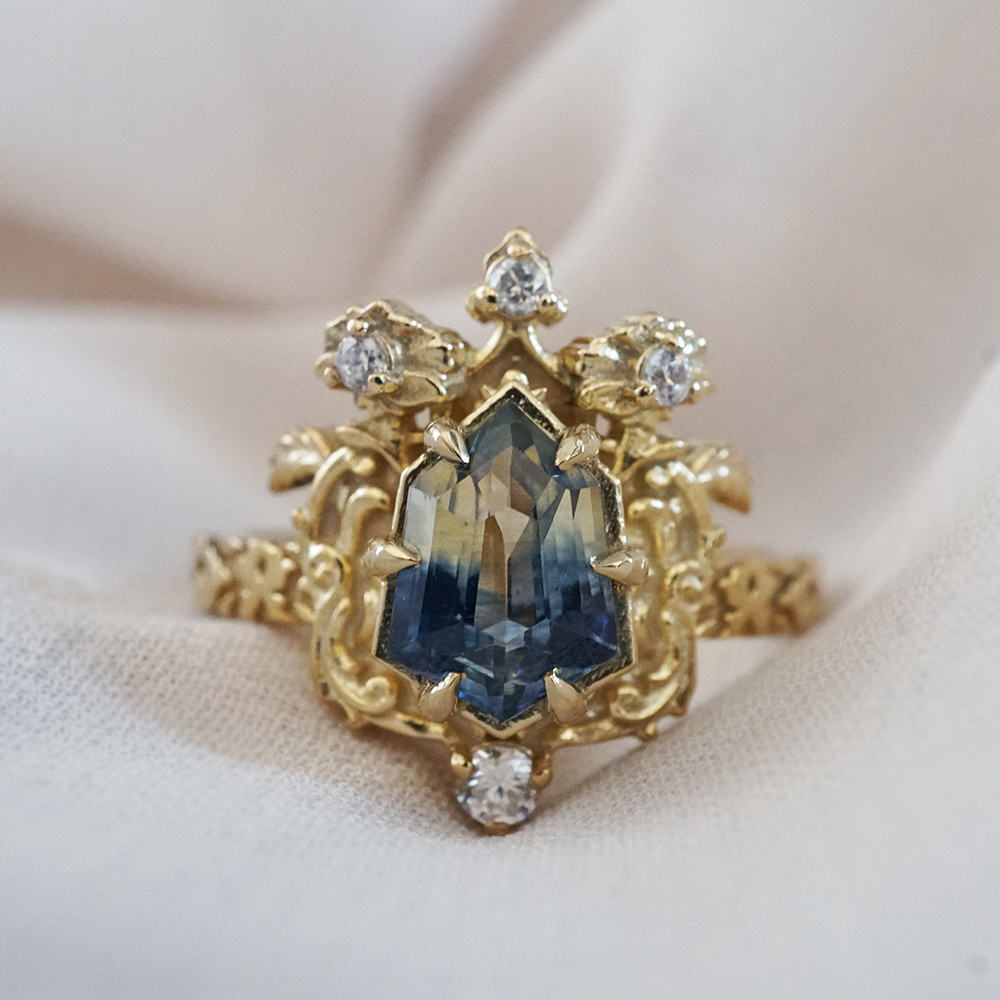 One Of A Kind: Bi Color Sapphire Shield Paradise Ring in 14K and 18K Gold