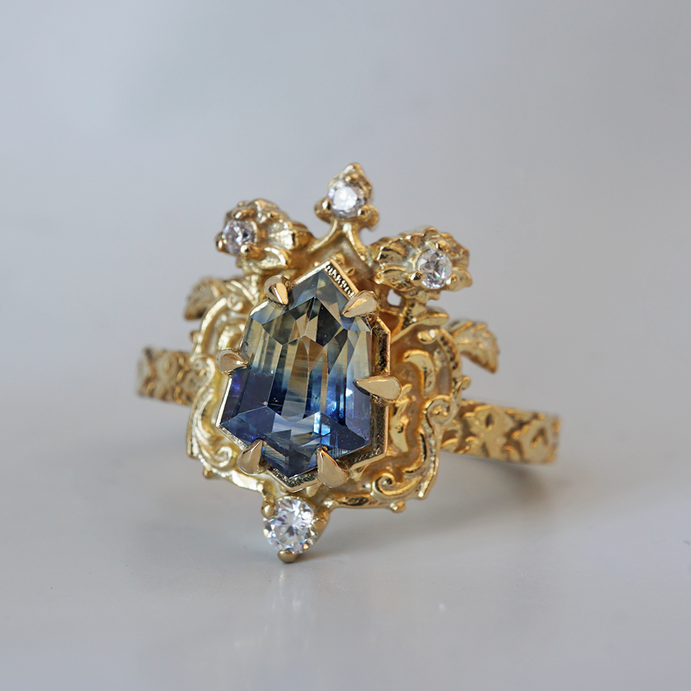 One Of A Kind: Bi Color Sapphire Shield Paradise Ring in 14K and 18K Gold