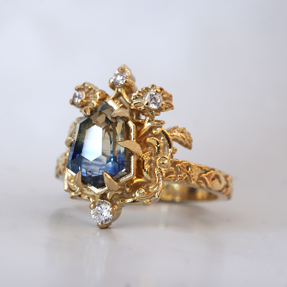 One Of A Kind: Bi Color Sapphire Shield Paradise Ring in 14K and 18K Gold