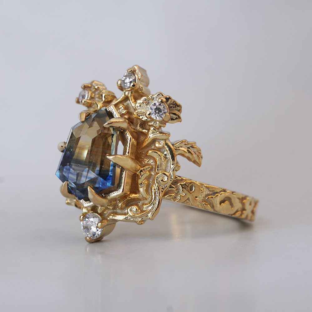 One Of A Kind: Bi Color Sapphire Shield Paradise Ring in 14K and 18K Gold