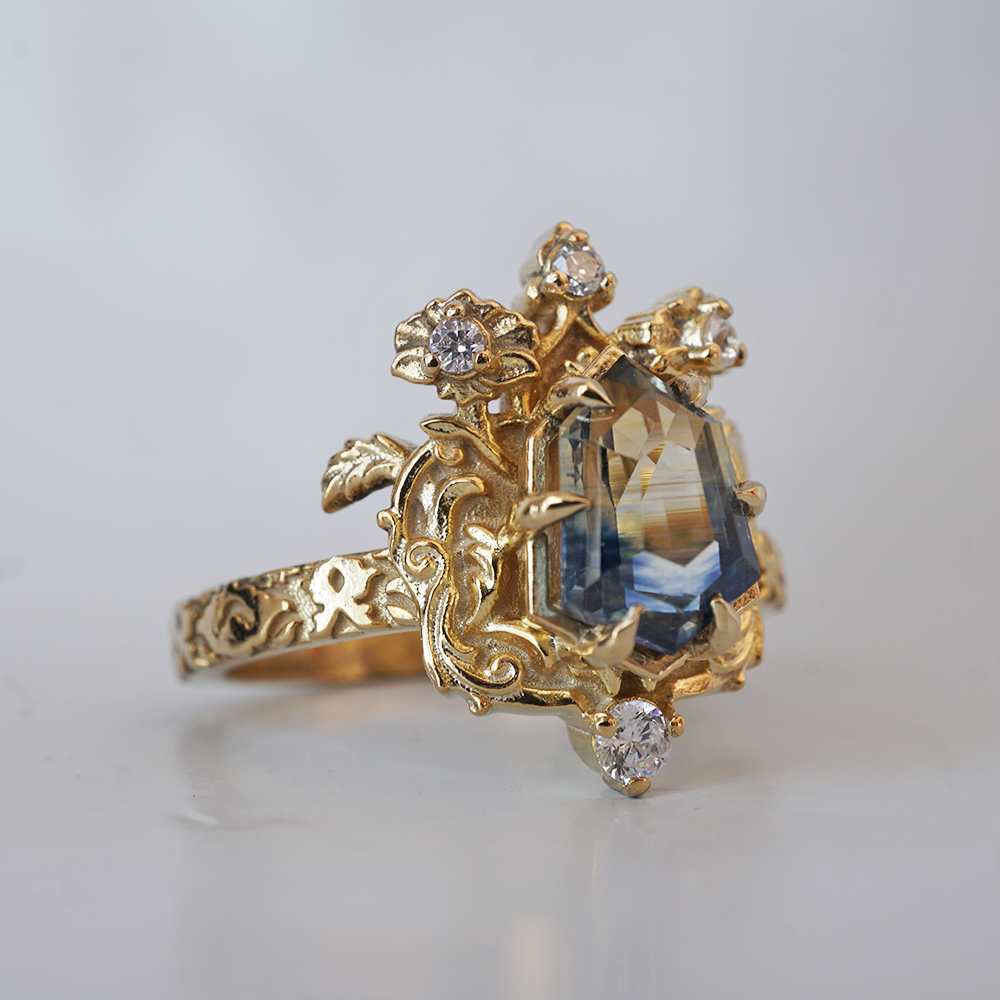 One Of A Kind: Bi Color Sapphire Shield Paradise Ring in 14K and 18K Gold