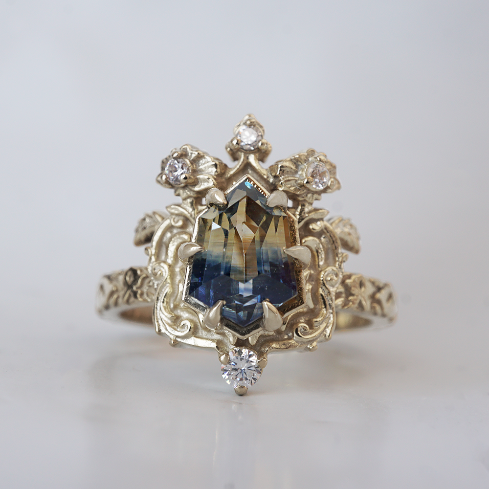 One Of A Kind: Bi Color Sapphire Shield Paradise Ring in 14K and 18K Gold